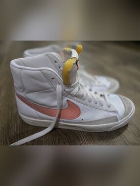 Nike White High-Top Sneakers with Pink Swoosh